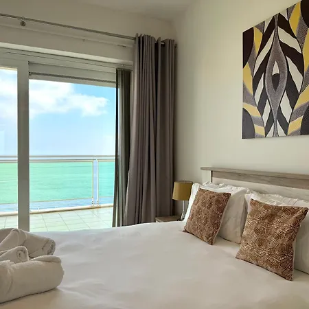 Апартаменты Modern Seafront 2br With Pool By Arcocollection