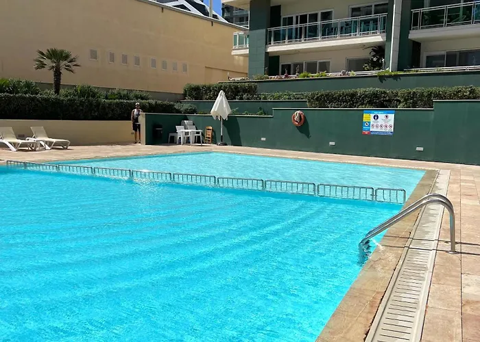 Апартаменты Modern Seafront 2br With Pool By Arcocollection