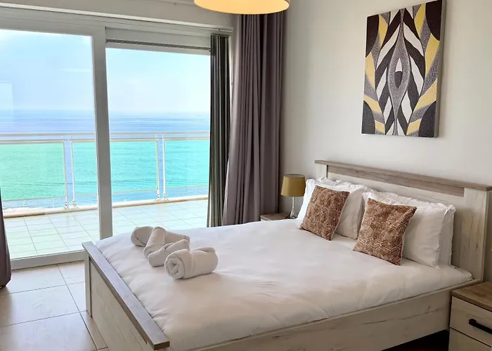 Апартаменты Modern Seafront 2br With Pool By Arcocollection *